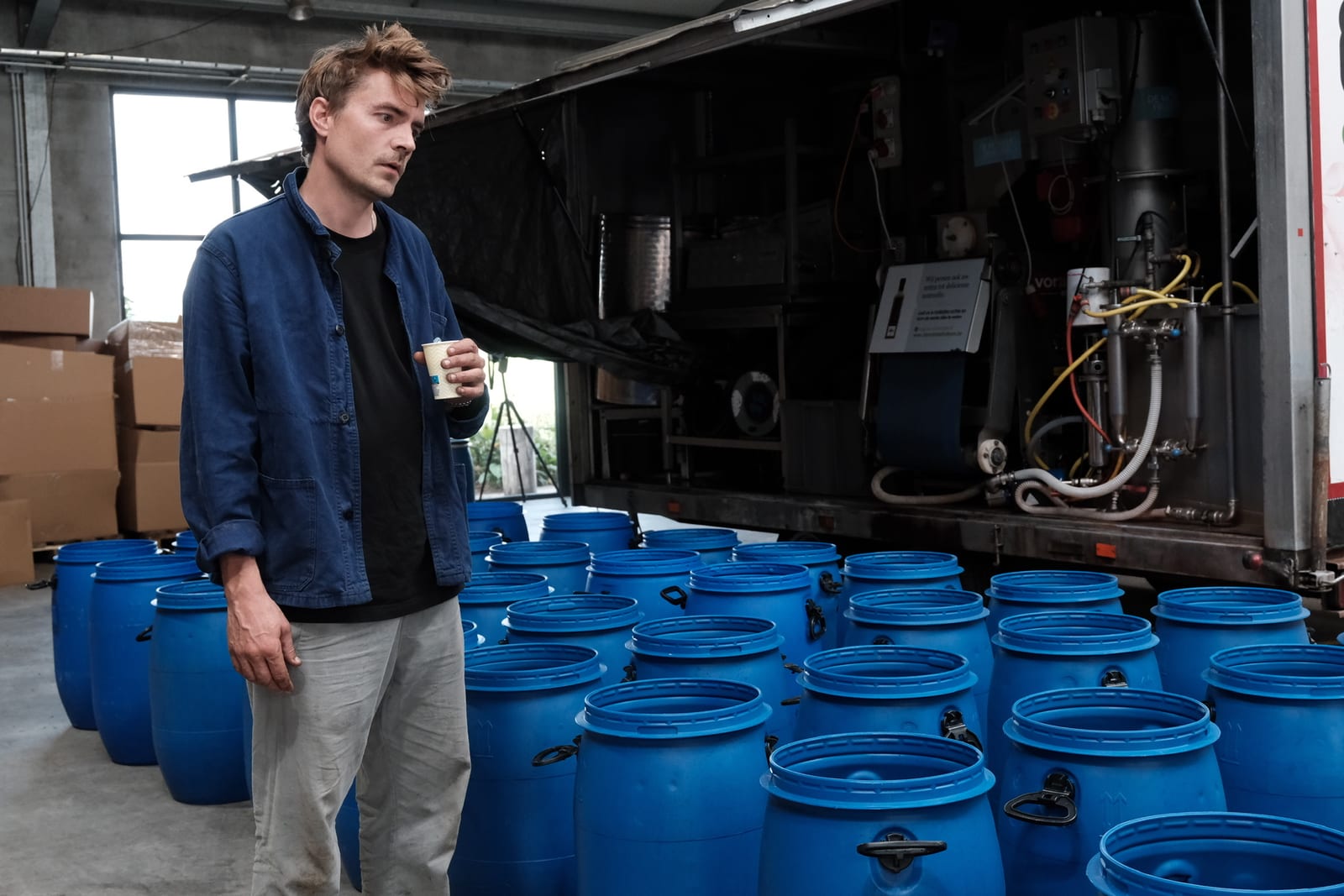Blue maceration barrels in the workshop